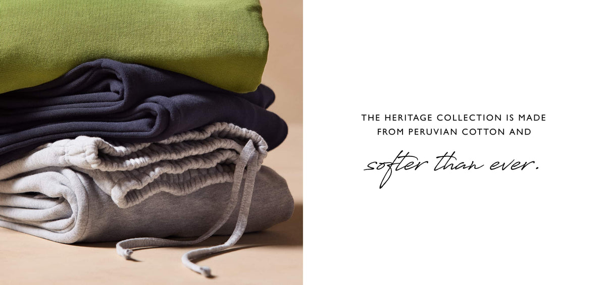 Stack of folded sweatshirts in the EVEREVE Heritage Collection.