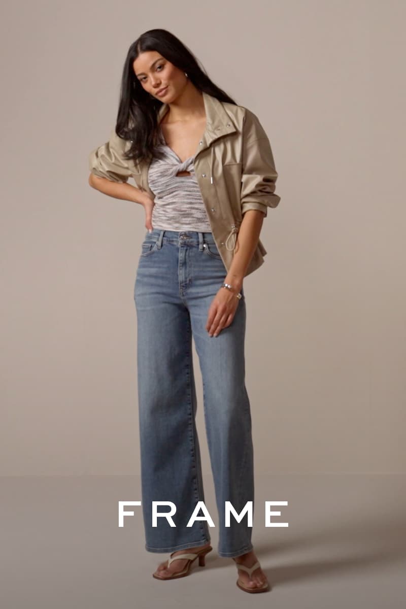Video of woman wearing Frame brand jeans.