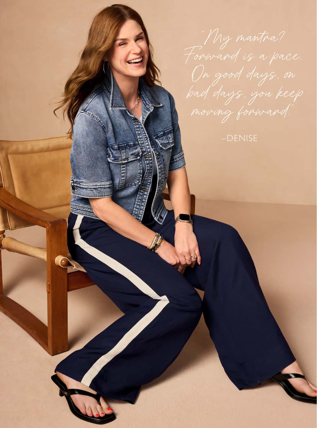 Image of Denise wearing denim jacket and navy pants