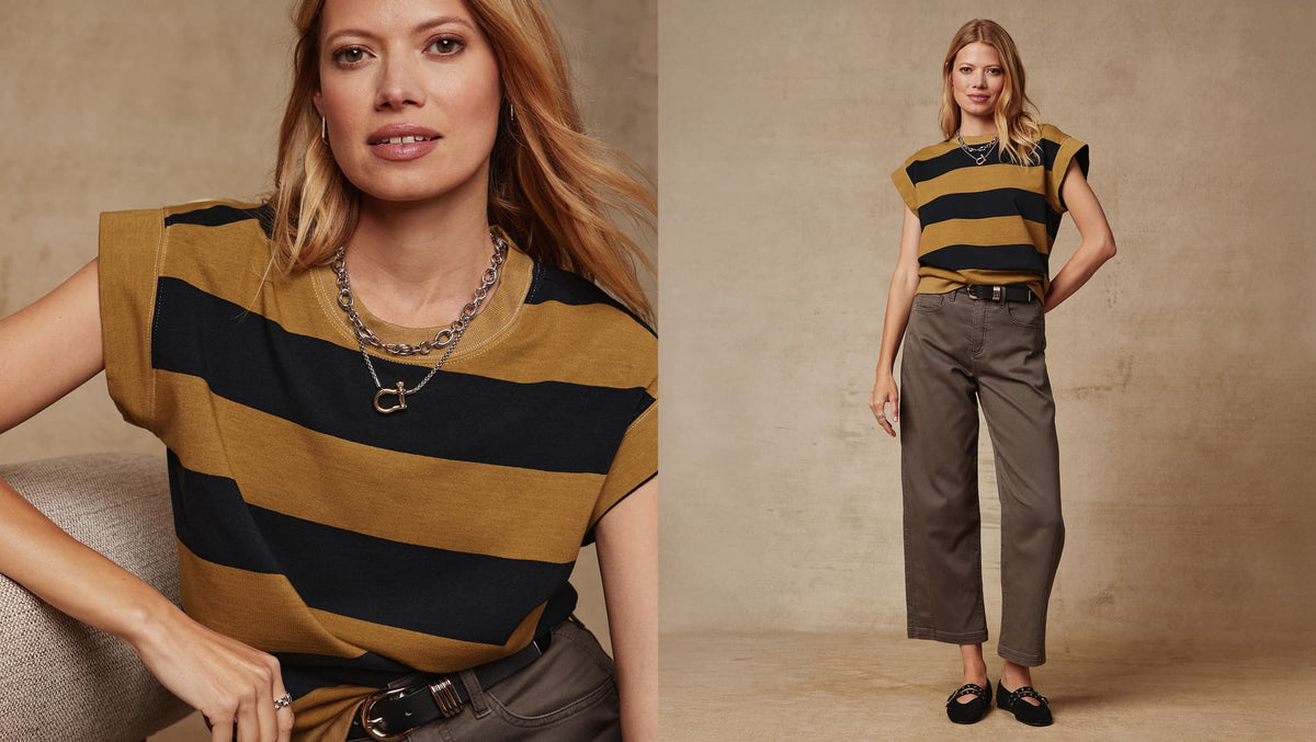 Image of woman wearing striped Sutton sweatshirt and Marni pants
