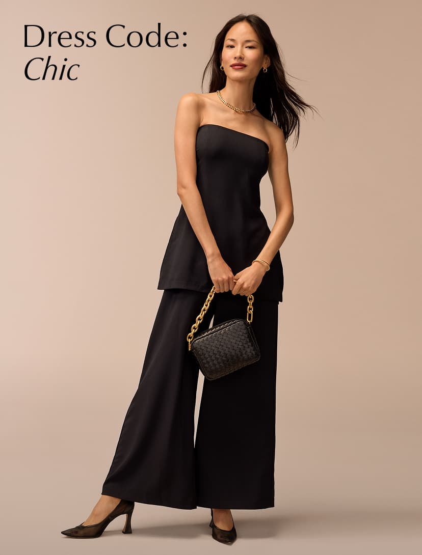 Image of woman wearing a black jumpsuit, text reads: Dress Code Chic.