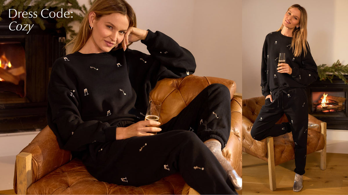 Image of woman wearing a matching black set, text reads: Dress Code Cozy.
