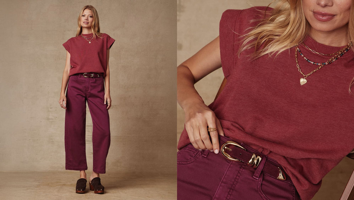 Image of woman wearing red Sutton sweatshirt and Marni pants