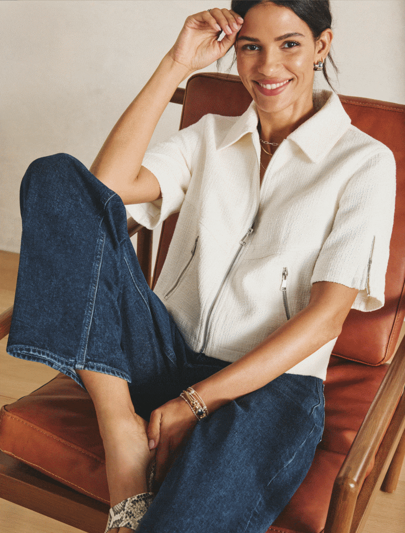 Image of woman wearing an ivory Billie jacket with wide leg dark jeans in two different looks. 